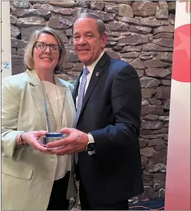  ?? PHOTO COURTESY TRICOUNTY AREA CHAMBER OF COMMERCE ?? Eileen Dautrich, left, president of the TriCounty Chamber of Commerce with Greg Herb of Herb Real Estate, recipient of the James K. Boyer Award at the chamber’s March 13 Boyertown Area Progress Dinner.