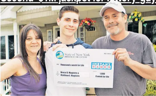  ??  ?? WINNER, WINNER! Fiancée Deborah Ward, son Matthew and lottery double-winner Bruce Magistro celebrate the bonanza Tuesday at their home in Lindenhurs­t, LI. The avid scratch-off player’s second windfall was predicted by the lottery’s Yolanda Vega (below).