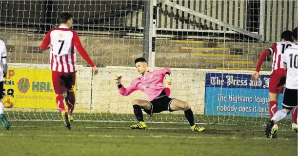  ??  ?? OPENING SALVO: Stuart Anderson, right, heads Formartine into the lead against Clach at Grant Street Park last night