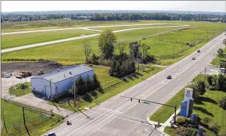  ?? TY GREENLEES / STAFF ?? Work to improve safety near the runway at the Dayton-Wright Brothers Airport in Miami Twp. is expected to start this fall, said Terry Slaybaugh, director of aviation for the city of Dayton, which oversees the site. Work to bury power lines along Ohio 741 should start in October as crews eliminate aircraft obstructio­ns near the south end of the runway.