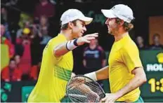  ?? AP ?? Australia’s John Peers (left) and Jordan Thompson celebrate after winning against Belgium during a Davis Cup World Group semi-final doubles match in Brussels on Saturday.