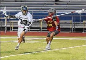  ?? AUSTIN HERTZOG - DIGITAL FIRST MEDIA ?? Spring-Ford’s Jarrod Marenger (33) looks to get past a West Chester East defender during a District 1-3A playoff game Thursday at Spring-Ford.