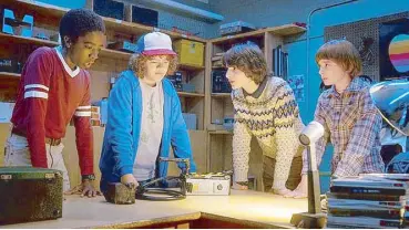  ??  ?? Buoyed by nostalgia for the ’80s and for its own first season, Netflix’s Stranger Things 2 brims with the pure joy of familiarit­y.