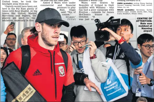 ??  ?? CENTRE OF ATTENTION: Bale was mobbed at Nanning airport