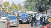  ?? HT ?? ▪ Haphazard parking on roadsides leads to jams on Ashok Marg