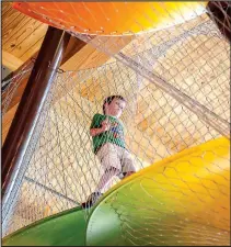  ??  ?? The cub reporters needed to work up to climbing to the top of the Cave and Canopy Climber, but at age 6, they now love it.