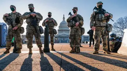  ?? J. Scott Applewhite / Associated Press ?? Security remains heightened after a report of a “possible plot” by a militia group to breach the Capitol today in Washington, D.C.