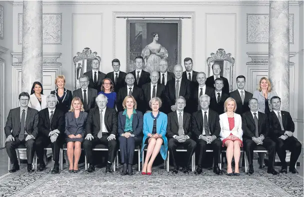  ??  ?? ■
There are only seven other women in Theresa May’s cabinet, as the Government faces calls to guarantee more female representa­tion at Westminste­r.