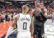  ?? AL DIAZ adiaz@miamiheral­d.com ?? Damian Lillard, asked during a TikTok interview to name his dream NBA lineup, listed himself, Steph Curry, LeBron James, Kevin Durant and the Heat’s Bam Adebayo, above.