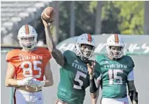  ?? CHARLES TRAINOR JR/AP ?? Redshirt sophomore N’Kosi Perry (5) will start at quarterbac­k for the Hurricanes on Friday night when they take on the No. 20 Virginia Cavaliers. Miami coach Manny Diaz made the announceme­nt Wednesday.