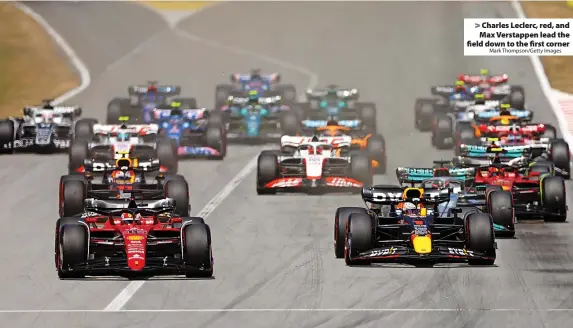  ?? Mark Thompson/Getty Images ?? Charles Leclerc, red, and Max Verstappen lead the field down to the first corner