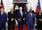  ?? PHOTO: REUTERS ?? United States President Joe Biden (centre) poses with leaders from the USPacific Island Country Summit at the White House in Washington yesterday.