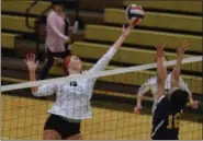  ?? AUSTIN HERTZOG - DIGITAL FIRST MEDIA ?? Boyertown’s Emily Wolfe (19) tips the ball over the net against Pope John Paul II.