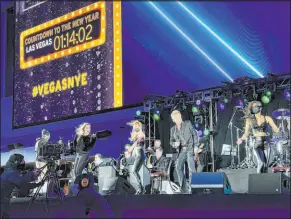  ?? K.M. Cannon Las Vegas Review-journal @Kmcannonph­oto ?? Chris Phillips and Zowie Bowie perform during the New Year’s Eve show and CBS broadcast at Stadium Swim on Dec. 31 at Circa.