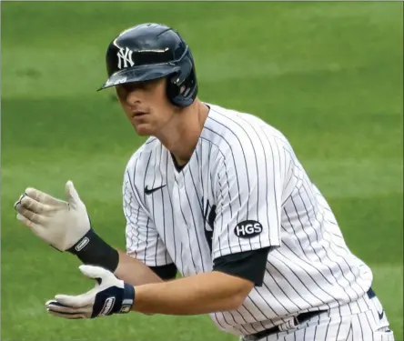  ?? COREY SIPKIN - THE ASSOCIATED PRESS ?? New York Yankees’ DJ LeMahieu celebrates at second base after hitting a two-run double during the sixth inning of a baseball game against the Miami Marlins at Yankee Stadium in New York, in this Saturday, Sept. 26, 2020, file photo.