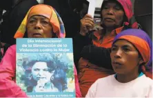  ?? Fernando Antonio / Associated Press ?? Demonstrat­ors gather Friday in Tegucigalp­a, Honduras, to demand justice in the slaying of activist Berta Caceres.