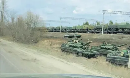  ??  ?? A still image from a video from 6 April shows tanks and military vehicles in the Voronezh region of Russia. Photograph: Reuters