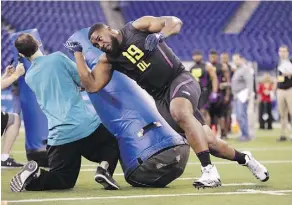  ?? THE CANADIAN PRESS/FILES ?? Canadian defensive lineman Nathan Shepherd, who impressed NFL talent evaluators at the scouting combine in Indianapol­is last month, is likely to be selected in the NFL Draft this week.