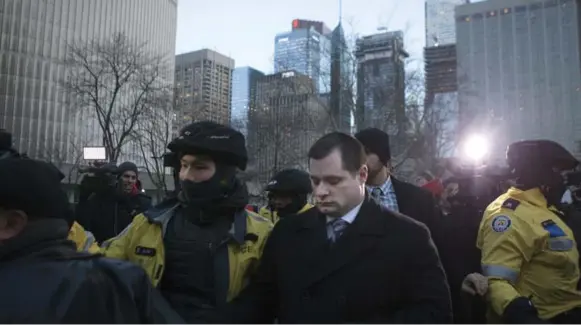  ?? CHRIS YOUNG/THE CANADIAN PRESS ?? Const. James Forcillo leaves court in Toronto on Monday after having been found guilty of attempted murder in the 2013 shooting death of Sammy Yatim on a streetcar.