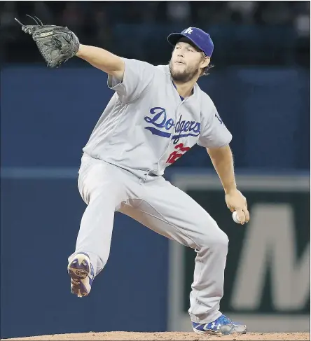  ?? — THE CANADIAN PRESS ?? Los Angeles Dodgers starting pitcher Clayton Kershaw throws against the Blue Jays during the first inning of their game Saturday afternoon in Toronto. The Dodgers won 6-2.