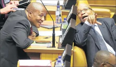  ?? PICTURE: PHANDO JIKELO ?? FRIVOLOUS: President Jacob Zuma shares a joke with ANC chief whip Jackson Mthembu after Zuma delivered the Presidency’s budget speech in Parliament yesterday. Zuma received a chilly reception from opposition MPs.