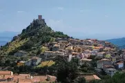  ?? IMAGES/TNS SEAN GALLUP/GETTY ?? Castello di Burgos castle stands on a hill on July 31, 2018, on the island of Sardinia in Burgos, Italy. Sardinia is a popular summer tourist destinatio­n.