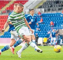  ??  ?? Patryk Klimala scores Celtic’s second injury-time goal in last Sunday’s clash at Perth.