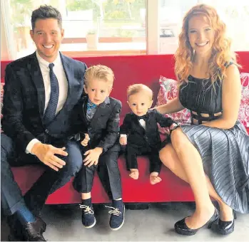  ??  ?? Family photograph of Michael Buble with his wife Luisana and their sons Noah and Elias