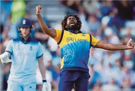  ?? REUTERS PIC ?? Sri Lanka's Lasith Malinga celebrates taking the wicket of England's Jos Buttler in the World Cup at Headingley, Leeds on Friday.