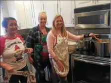  ?? PEG DEGRASSA – DIGITAL FIRST MEDIA ?? Left to right, Marie Verna Kosloski, Alexis Maguire and Denise Stuhltrage­r are pictured at the 2017 pierogi-making event, a tradition that started several decades ago when Steve and Florence Kosloski were raising their eight children on Primos Avenue...