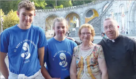  ??  ?? Jack and Kate Brangan (Dardistown) with (grandmothe­r) Lily Brangan &amp; Fr Robert McCabe on the Lourdes Pilgrimage.