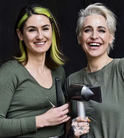  ?? PHOTO: PETER MCINTOSH ?? Cuts for charity . . . Zen Hair codirector­s Liana KingBiddul­ph (left) and Haley Cron will be cutting hair to raise funds for the Otago Community Hospice this weekend.