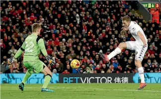  ??  ?? This Chris Wood goal against Liverpool was disallowed for offside, but the Kiwi striker aspires to play at places like Anfield.