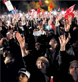  ?? AP/LEFTERIS PITARAKIS ?? Supporters of Turkish President Recep Tayyip Erdogan celebrate Sunday in Istanbul.