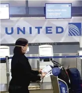  ?? GETTY IMAGES ?? United Airlines and its pilots union have reached a tentative agreement to reduce the number of forced job losses.