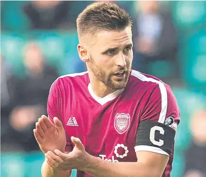  ?? SNS. ?? Lichties captain Mark Whatley’s 25-yard goal helped knock Ayr off the top of League One.