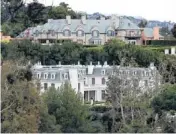  ?? MCT PHOTO ?? Chateau des Fleurs, at bottom in photo, is nearing completion in Bel-Air, Calif. At 60,000 square feet, it is still not the biggest home in Los Angeles, but it’s nothing to sneeze at.
