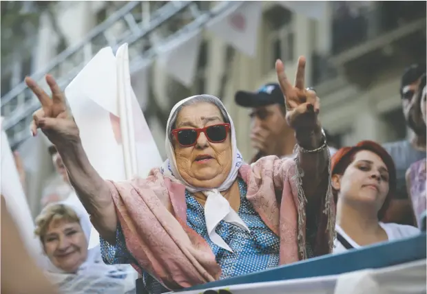  ?? VICTOR R. CAIVANO / THE ASSOCIATED PRESS ?? Hebe de Bonafini, president of Madres de la Plaza de Mayo human rights group, gestures during the march to mark the 41th anniversar­y of the military coup in Buenos Aires in 2017. Long a polarizing political force in Argentina, de Bonafini has died at the age of 93.