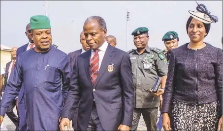 ??  ?? L-R: Imo State Governor, Hon. Emeka Ihedioha; Vice President Yemi Osibanjo; and his wife, Dolapo at the Sam Mbakwe Internatio­nal Cargo Airport, Owerri, on arrival for a function in Imo State…yesterday