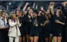  ?? Photograph: Brad Smith/ISI Photos/Getty Images ?? Sophia Smith (centre) of the Portland Thorns celebrates her MVP trophy after the NWSL Cup Final against Kansas City Current on 29 October, 2022 in Washington, DC.