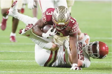  ?? STEPHEN M. DOWELL/ORLANDO SENTINEL ?? FSU running back Trey Benson, top, is one of 14 transfers who joined the Seminoles roster in 2022. Most of those transfers played a crucial role in helping FSU win 10 games for the first time since 2016.