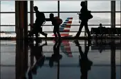  ?? ANDREW HARRER / BLOOMBERG ?? The “Quiet Skies” program raises questions about the privacy of ordinary Americans as they go about routine travel within the United States.