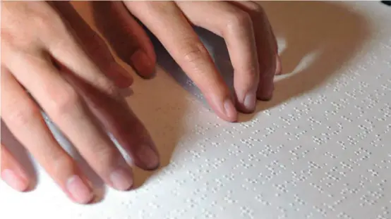  ?? ?? Braille is a universal tactile code read by visually impaired people.