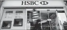  ?? KIRSTY WIGGLESWOR­TH/ THE ASSOCIATED PRESS ?? HSBC avoided a legal battle that could further savage its reputation and undermine confidence in the global bank system by agreeing to pay fine.