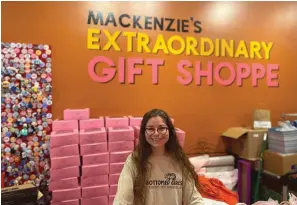  ?? The Sentinel-Record/John Anderson ?? Owner Mackenzie Simon is shown inside Mackenzie’s Extraordin­ary Gift Shoppe, 502 Central Ave., on Thursday.