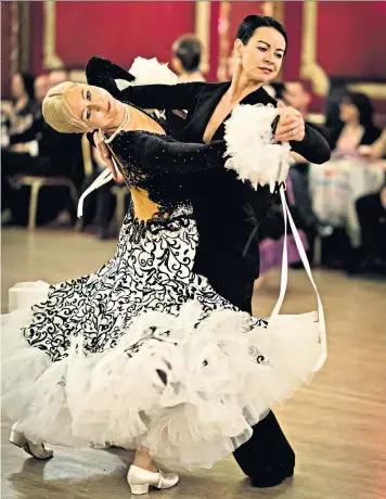  ??  ?? Same-sex ballroom champions Petra Zimmermann and Caroline Privou, above; and, below, 2017 Strictly contestant Susan Calman