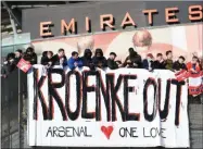  ?? KIRSTY O’CONNOR - THE ASSOCIATED PRESS ?? Fans protest against Arsenal owner Stan Kroenke before the English Premier League match against Everton, at the Emirates Stadium in London, Friday April 23, 2021.