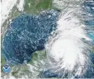  ?? NATIONAL HURRICANE CENTER ?? Hurricane Michael spins near Cuba on Monday.