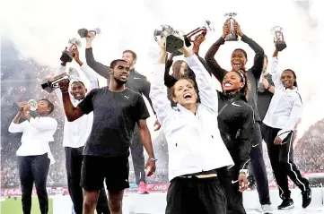  ?? — Reuters photo ?? Athletes celebrate during the trophy ceremony at the end of the IAAF Diamond League meeting Weltklasse in Zurich.