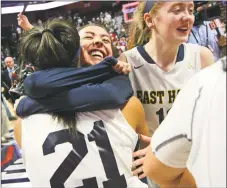  ?? Christian Abraham / Hearst Connecticu­t Media ?? East Haven celebrates its win over Career in the Class M championsh­ip game on Saturday in Uncasville.